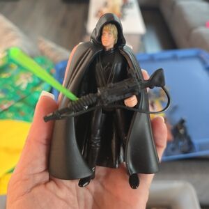 Star Wars Action Figure with Black Cape and Green Lightsaber